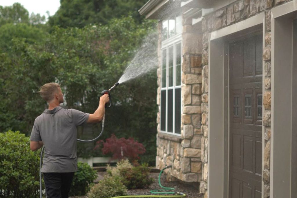 Gentle soft washing technique on exterior surface